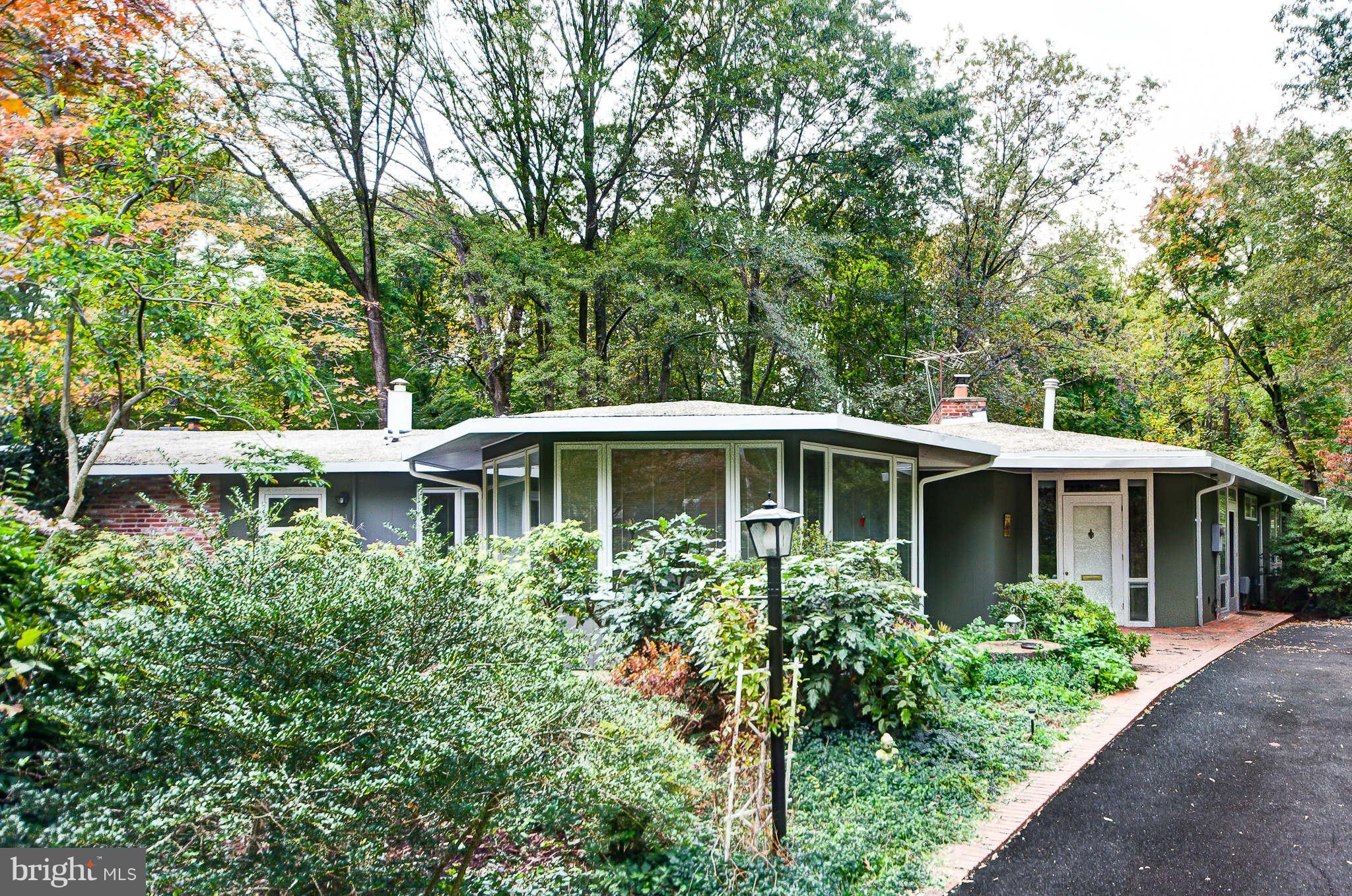 7308 Stafford Road Alexandria, VA 22307 - Photo 2 of 30 front view of a house with a yard