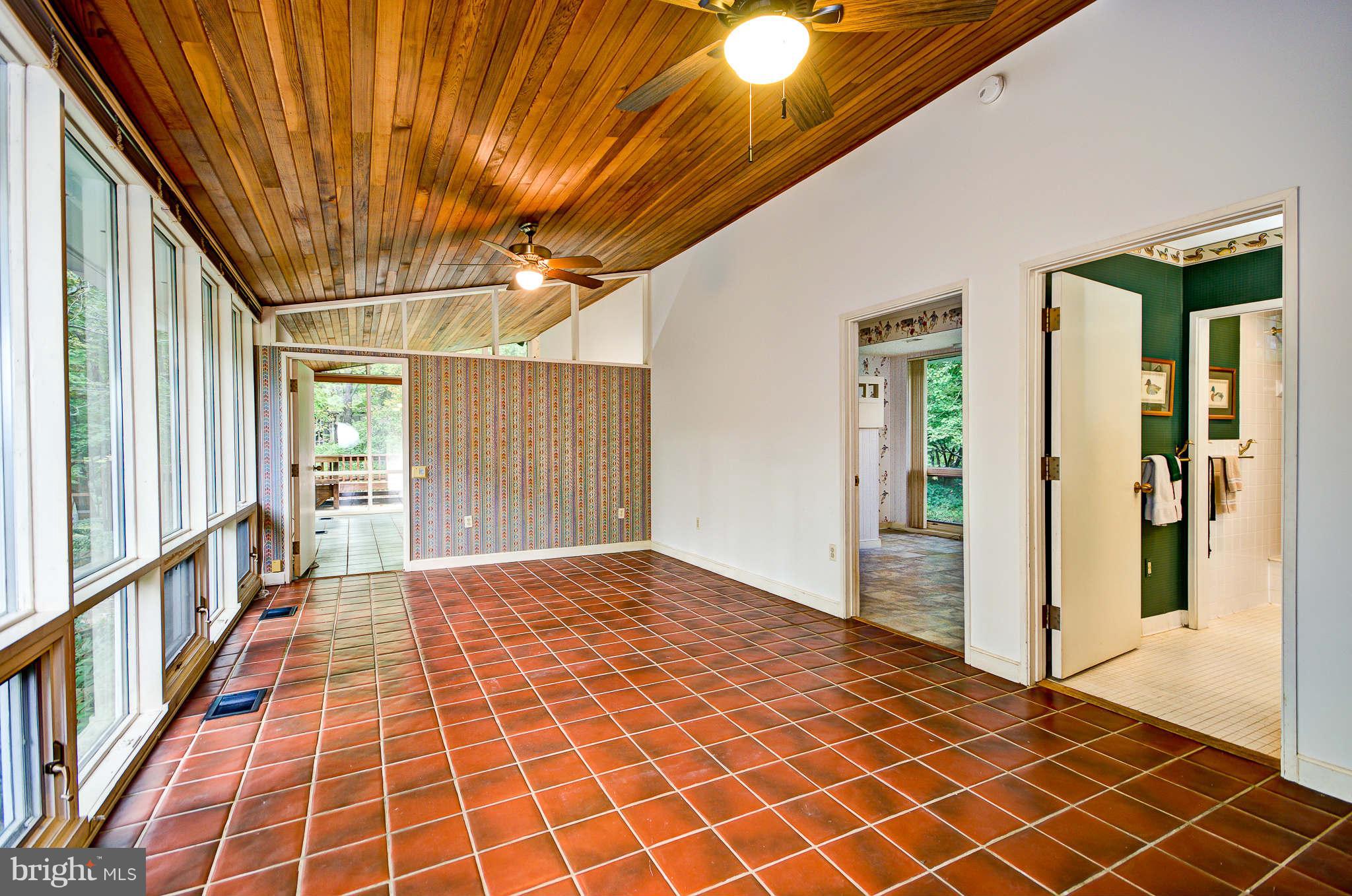 7308 Stafford Road Alexandria, VA 22307 - Photo 12 of 30 a view of empty room with wooden floor
