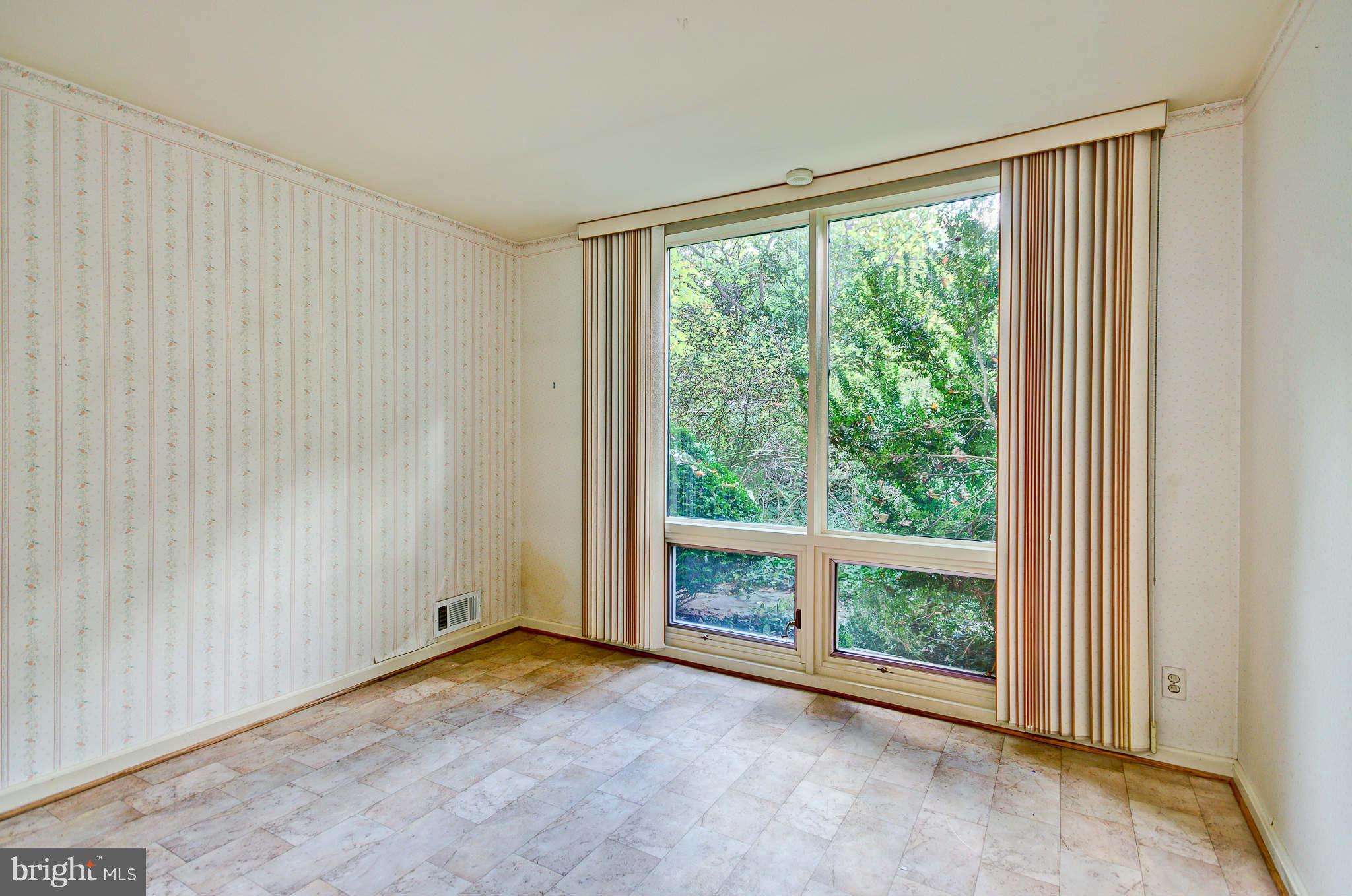 7308 Stafford Road Alexandria, VA 22307 - Photo 23 of 30 a view of an empty room with a window