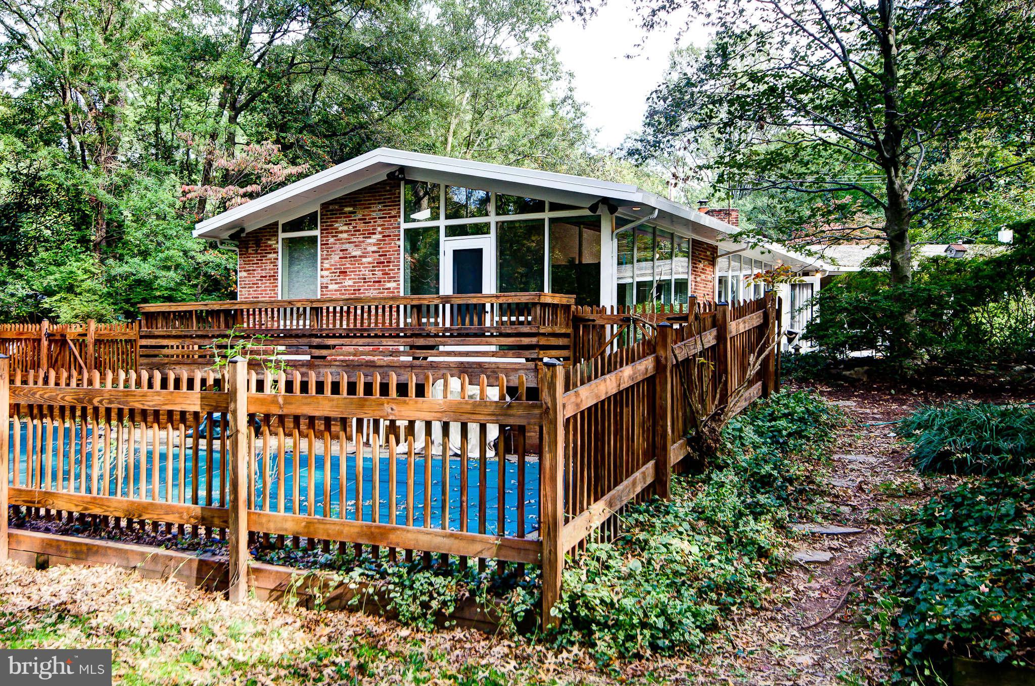 7308 Stafford Road Alexandria, VA 22307 - Photo 28 of 30 a view of a house with wooden deck