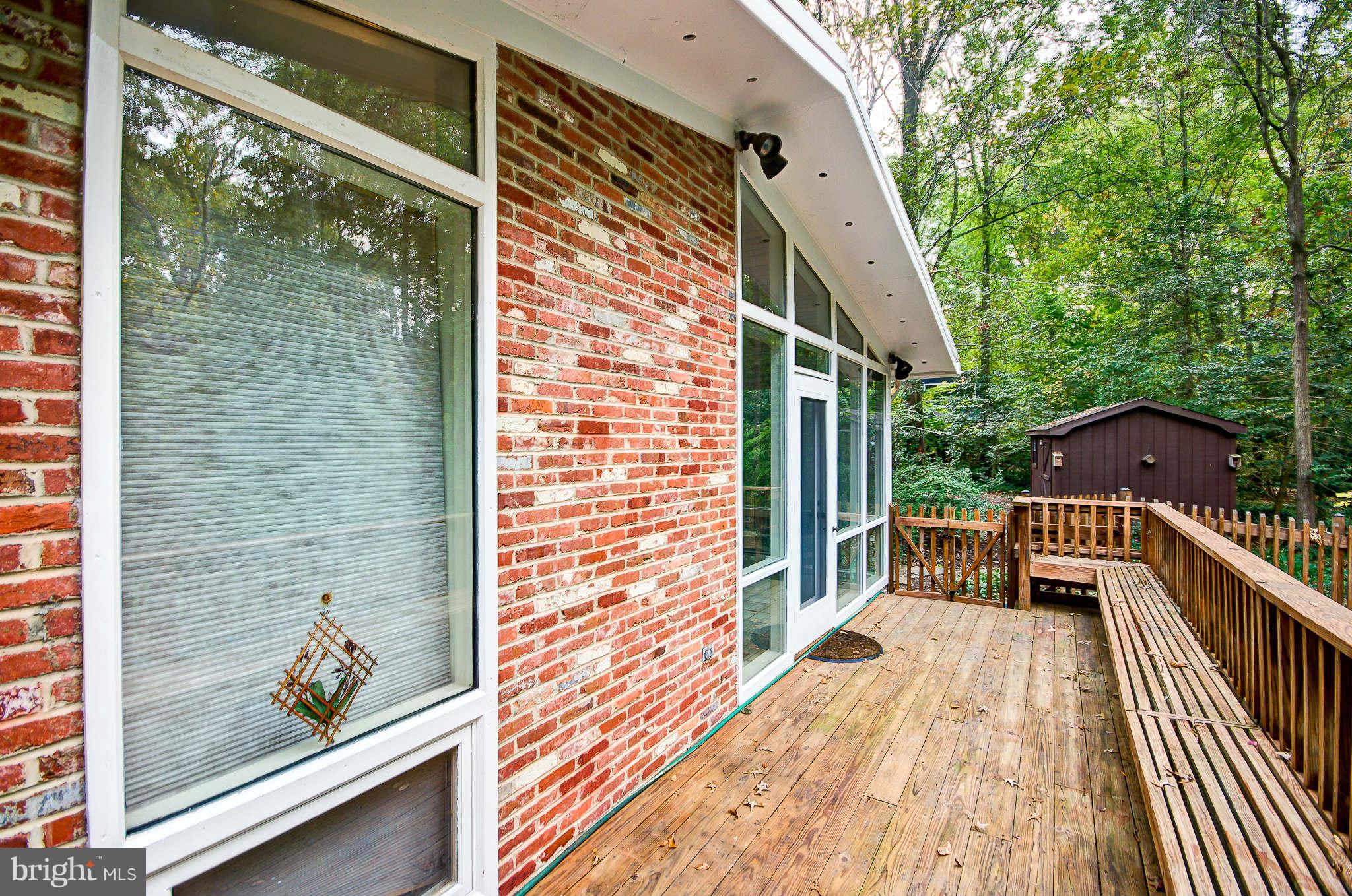 7308 Stafford Road Alexandria, VA 22307 - Photo 29 of 30 a balcony with wooden floor