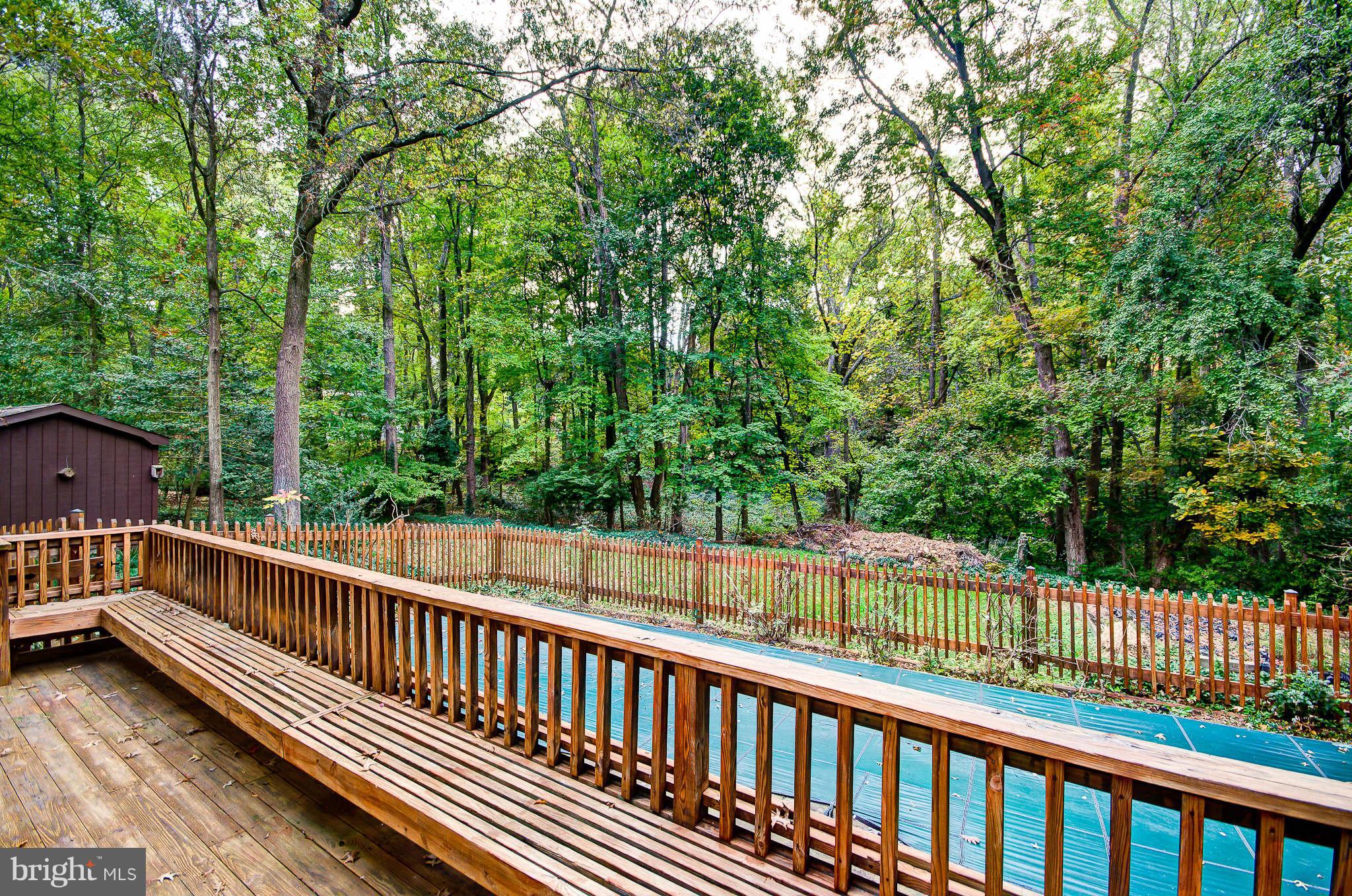 7308 Stafford Road Alexandria, VA 22307 - Photo 30 of 30 a view of balcony with deck and trees