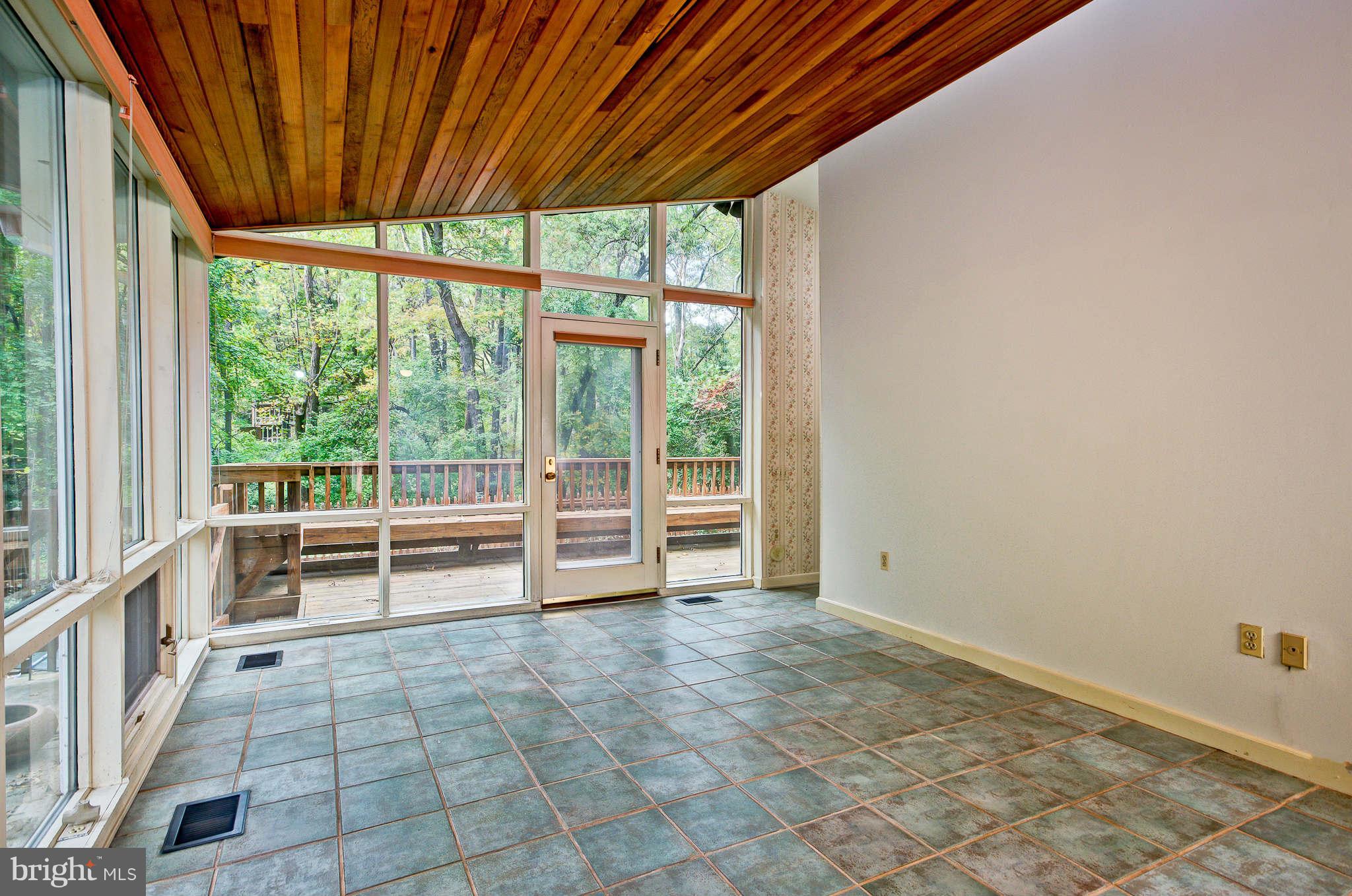 7308 Stafford Road Alexandria, VA 22307 - Photo 4 of 30 a view of an empty room with a balcony