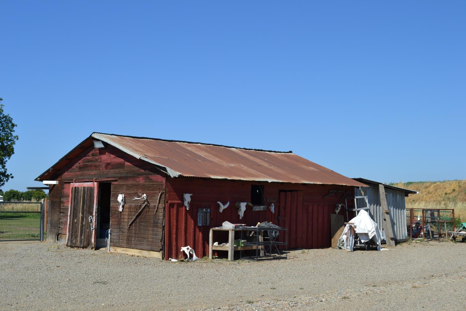 821 Orestimba Road Newman, CA 95360 - Photo 29 of 34 a view of a car parked in front of a house