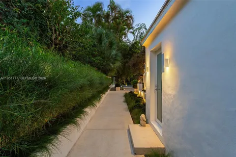 a view of a backyard with a garden