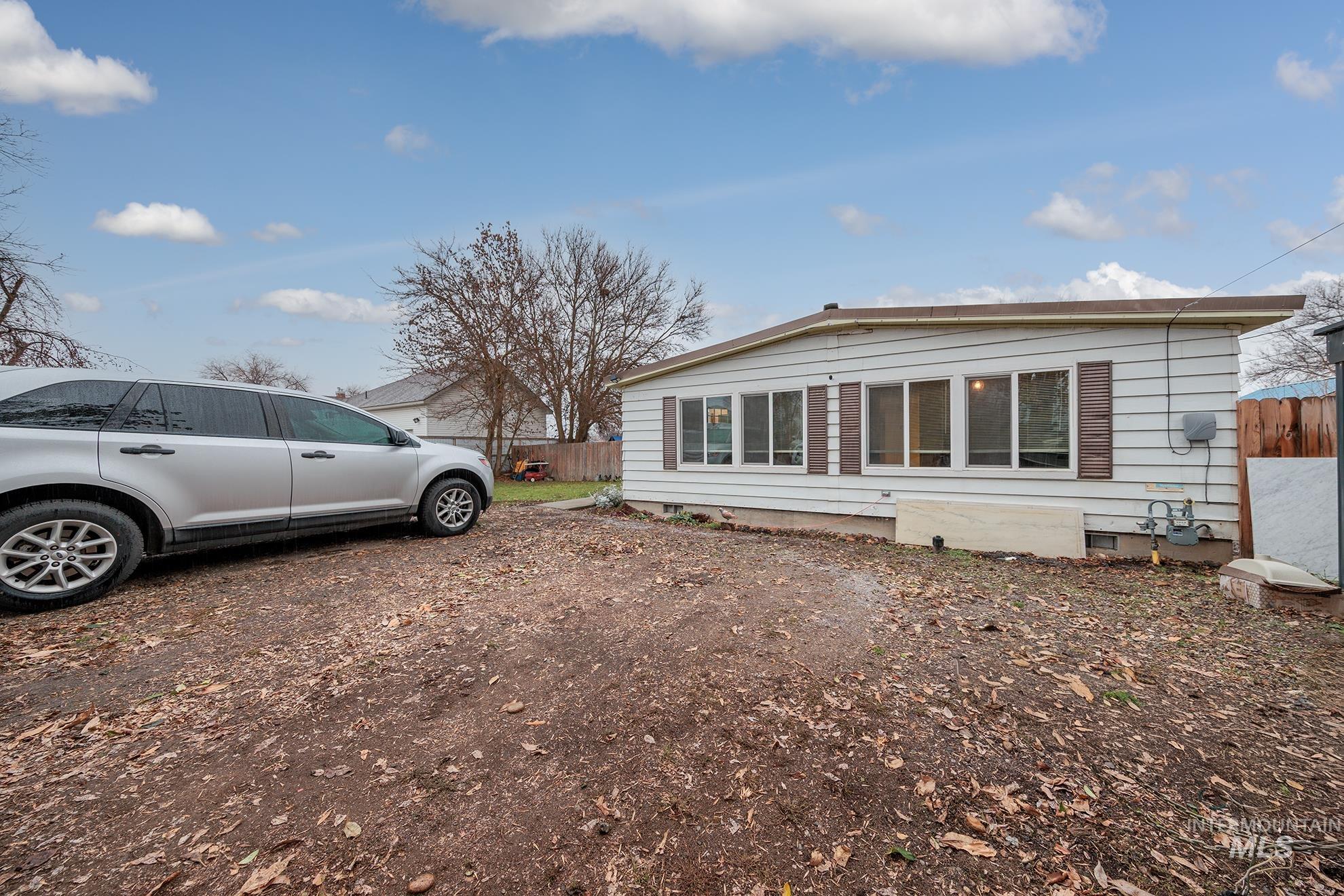 1165 Pioneer Road Weiser, ID 83672 - Photo 3 of 24 View of side of home
