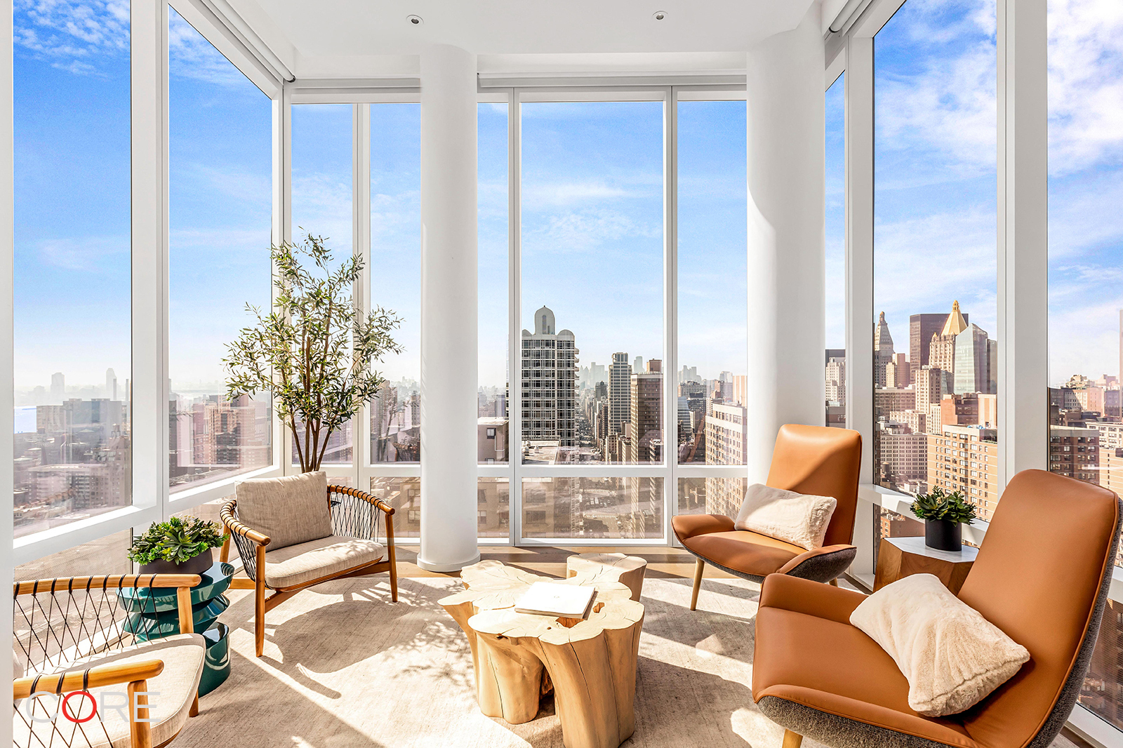 501 3rd Avenue, Unit 20C Manhattan, NY 10016 - Photo 7 of 17 a living room with furniture and a large window