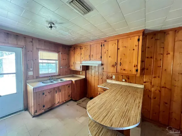 a view of a livingroom with wooden floor