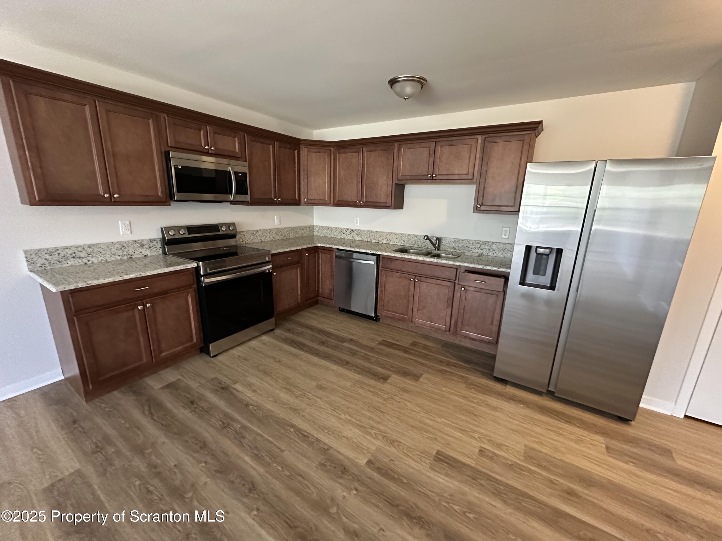 175 Bianca Way Old Forge, PA 18518 - Photo 7 of 28 Kitchen in Brown Shaker