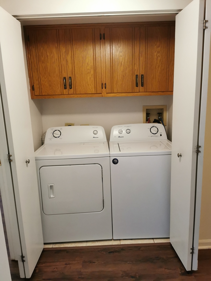 1424 Rock Run Drive, Unit B1 Crest Hill, IL 60403 - Photo 9 of 14 a utility room with dryer and washer