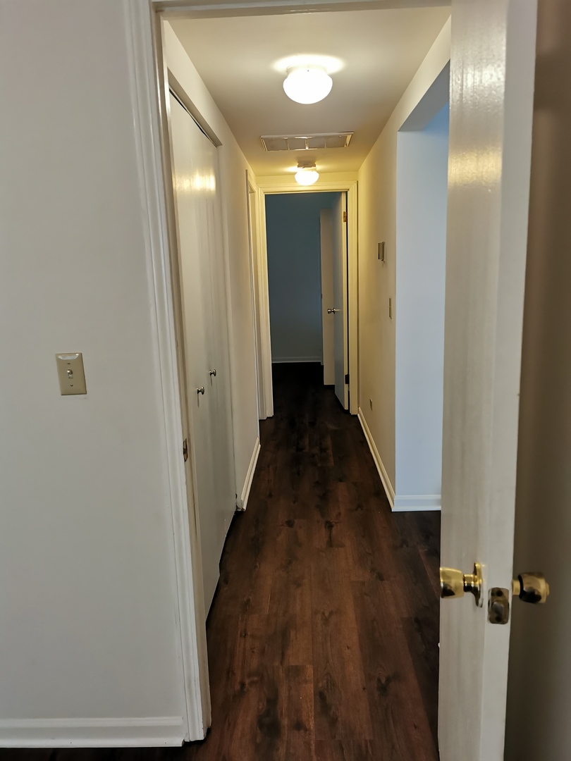 1424 Rock Run Drive, Unit B1 Crest Hill, IL 60403 - Photo 10 of 14 a view of a hallway