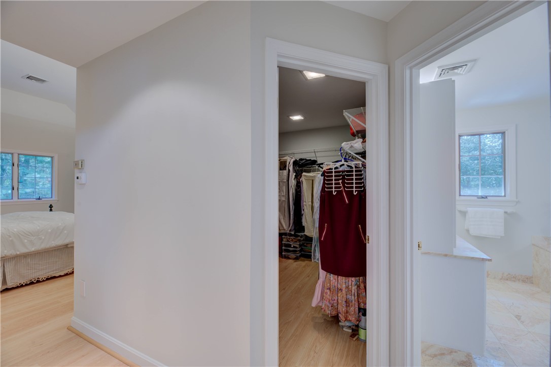 137 Signal Ridge Way East Greenwich, RI 02818 - Photo 34 of 50 Primary Walk-in Closet; Pull Down Stairs to Attic