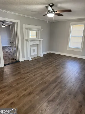 a view of a town with large trees