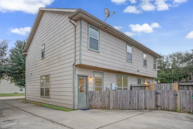 a front view of a house with a garage