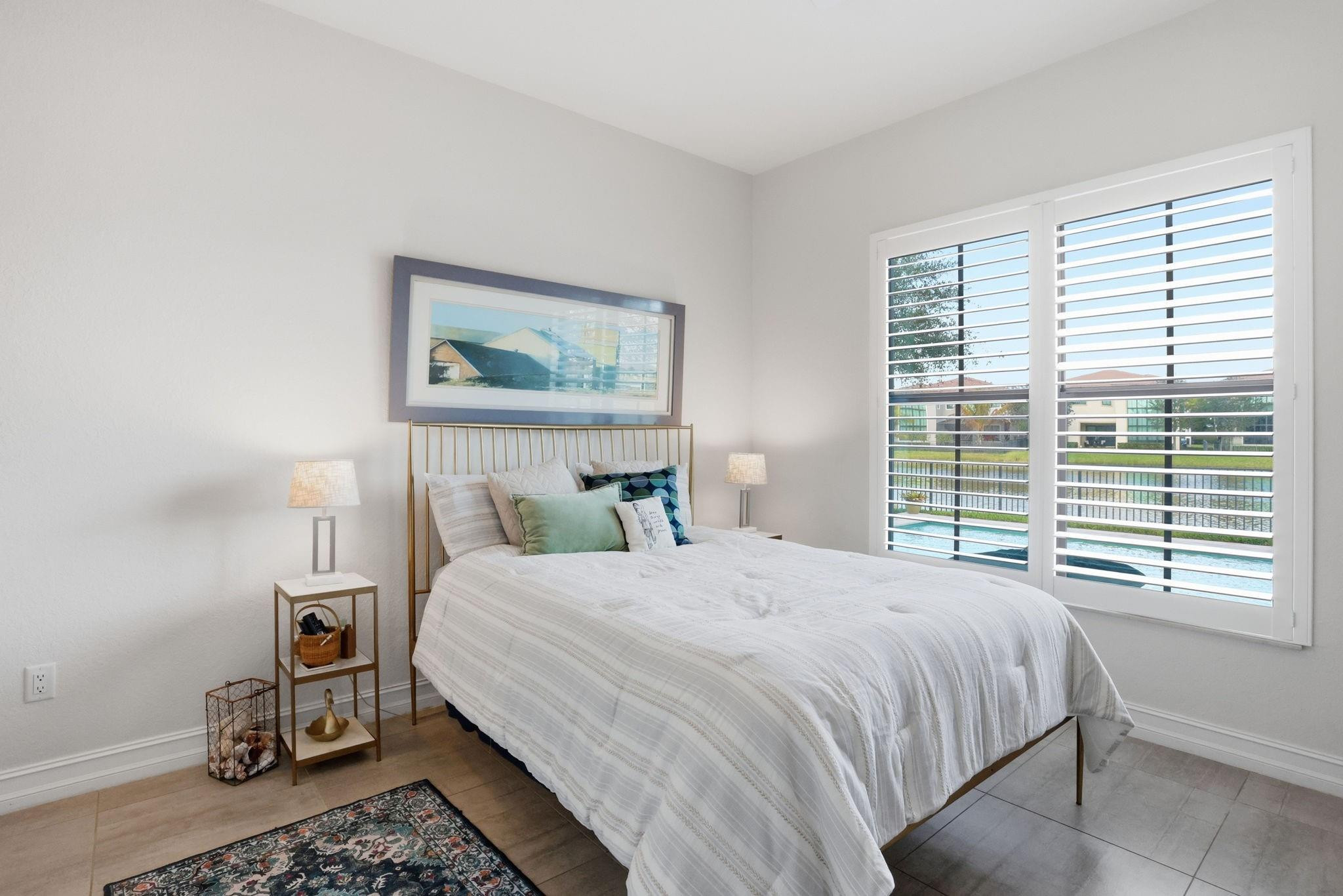 11585 Horizon Road Parkland, FL 33076 - Photo 18 of 91 a bedroom with a bed a painting and a window
