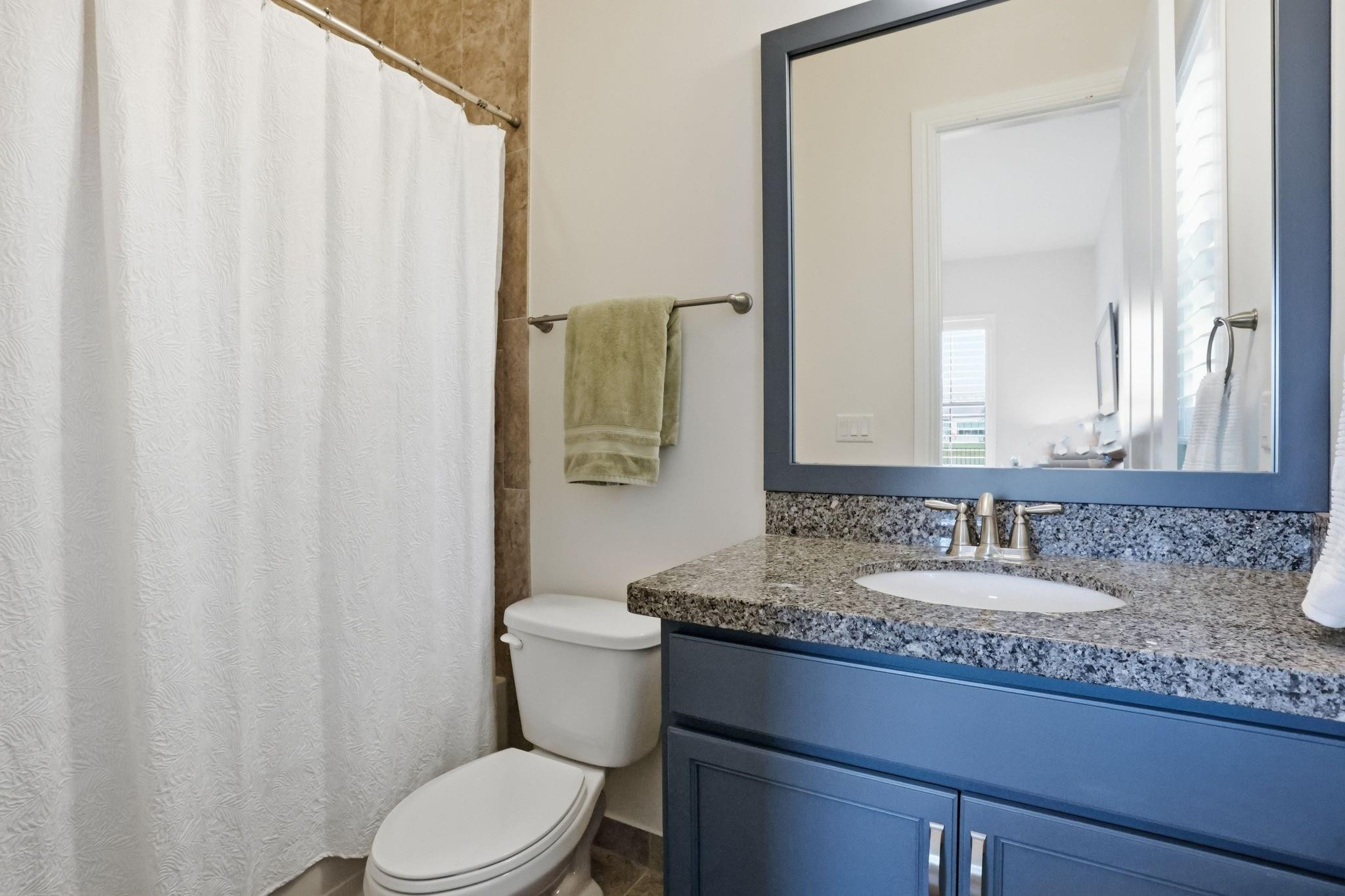 11585 Horizon Road Parkland, FL 33076 - Photo 20 of 91 a bathroom with a granite countertop toilet sink and mirror