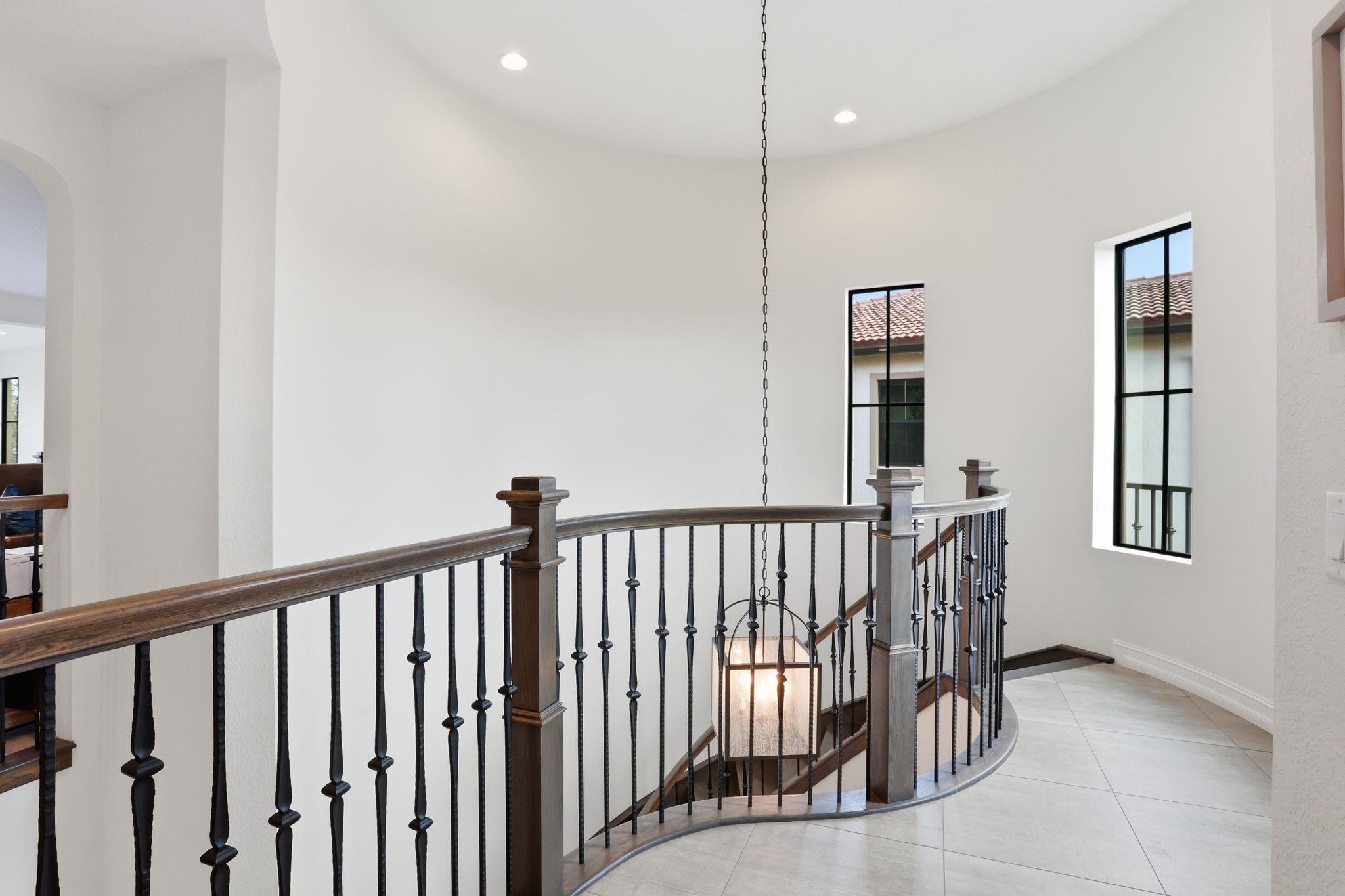 11585 Horizon Road Parkland, FL 33076 - Photo 27 of 91 a view of a hallway with windows