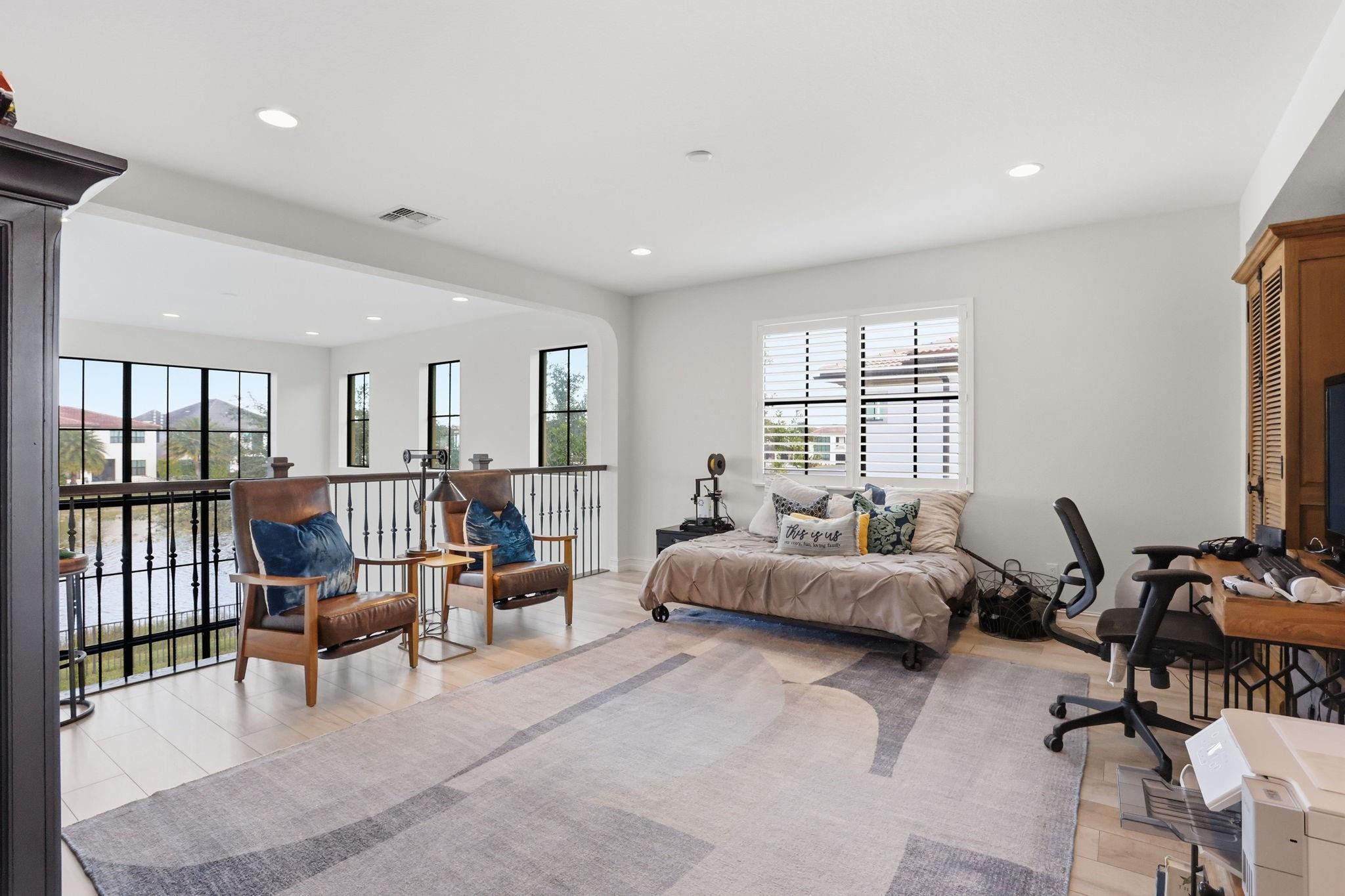 11585 Horizon Road Parkland, FL 33076 - Photo 28 of 91 a living room with furniture and a large window