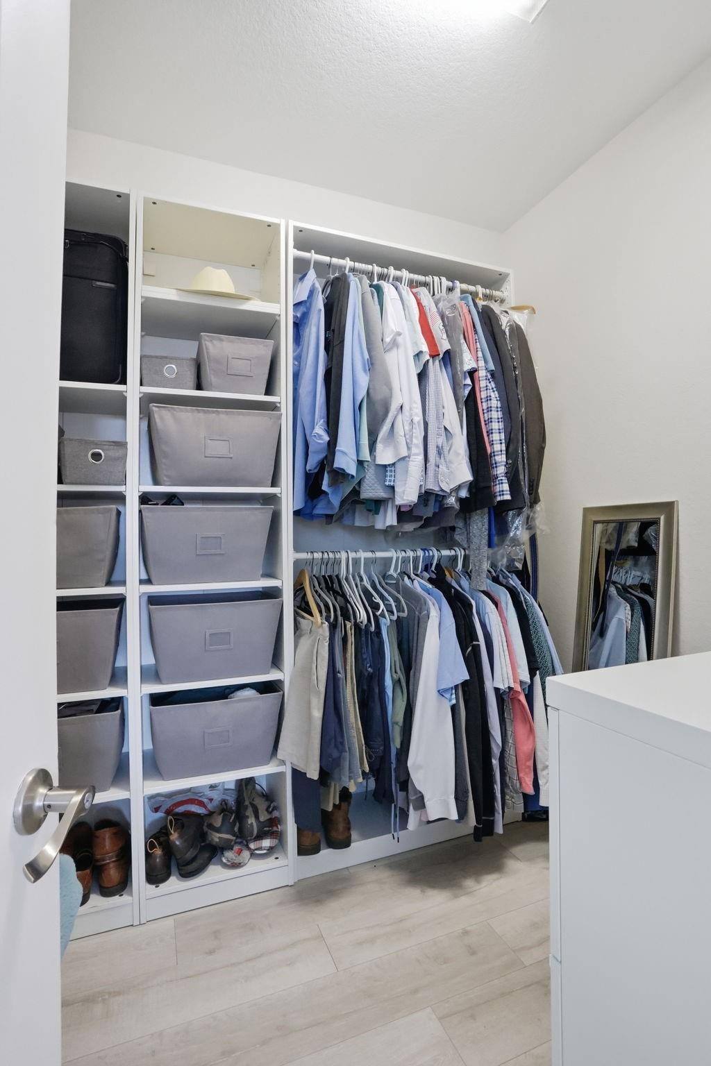 11585 Horizon Road Parkland, FL 33076 - Photo 35 of 91 a view of walk in closet with clothes and shoes