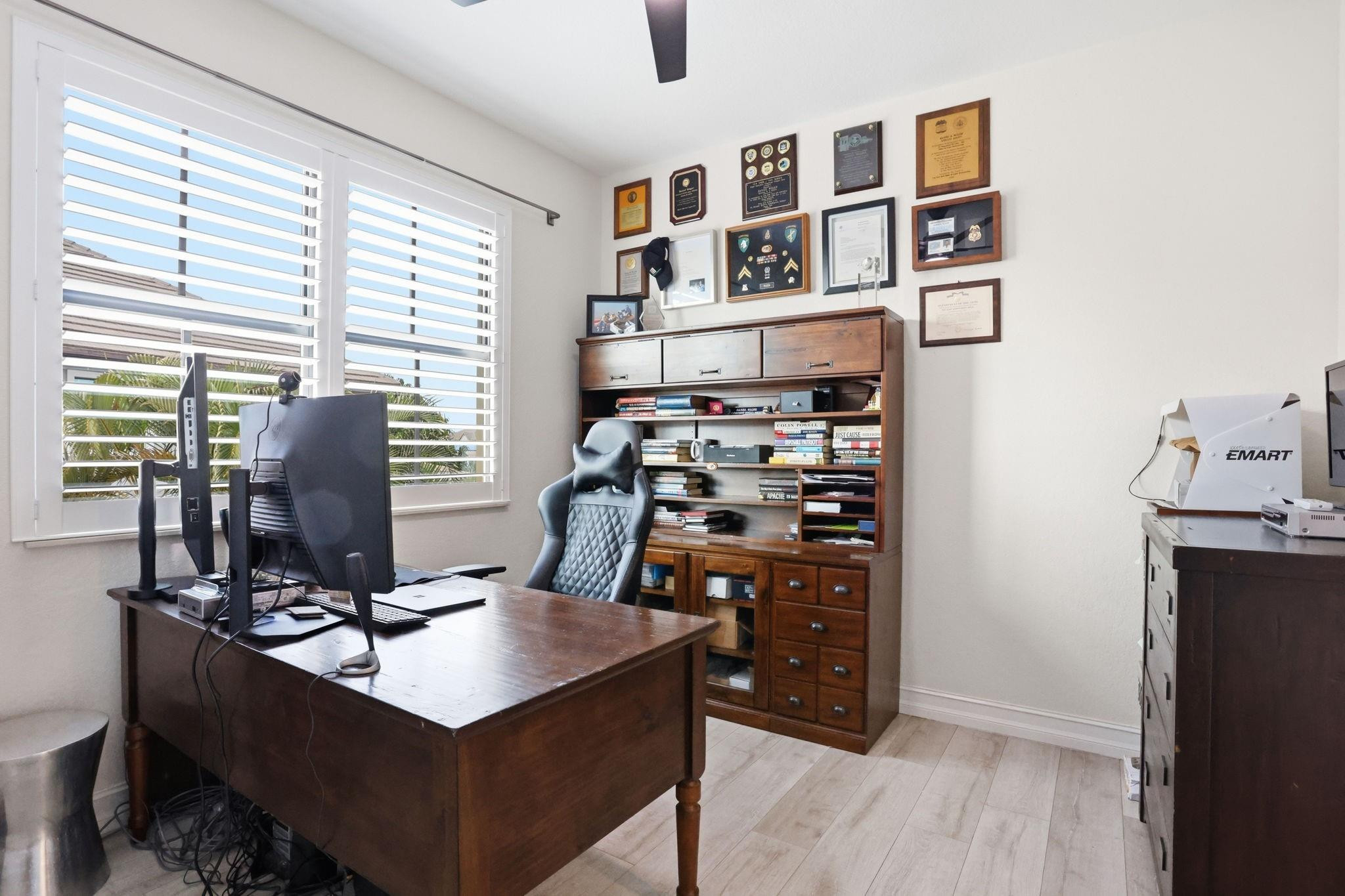 11585 Horizon Road Parkland, FL 33076 - Photo 42 of 91 a view of a workspace with furniture and a window