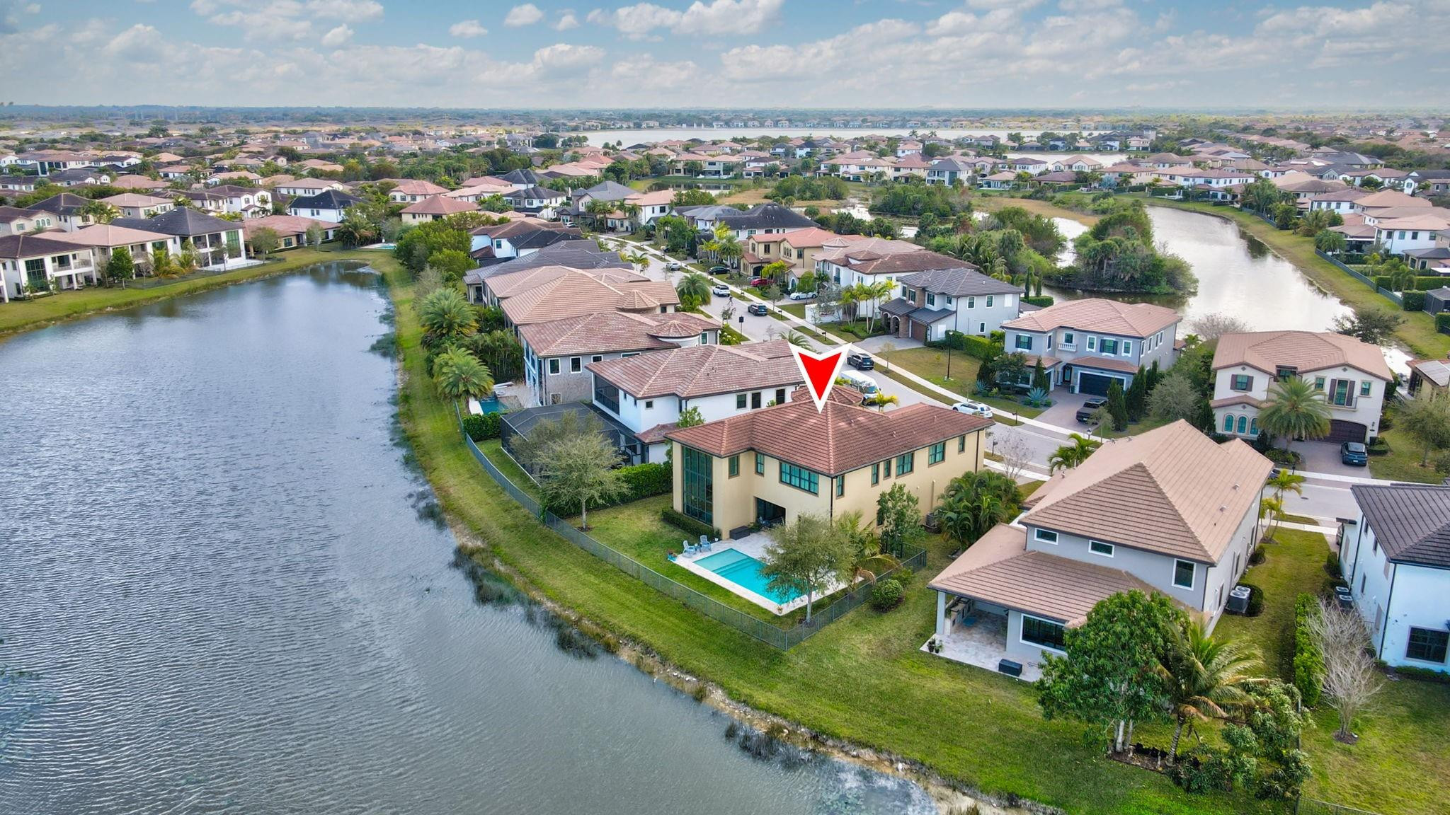 11585 Horizon Road Parkland, FL 33076 - Photo 59 of 91 an aerial view of residential houses with outdoor space and river