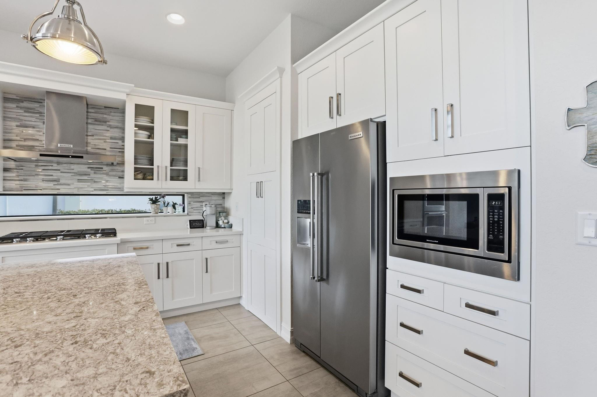 11585 Horizon Road Parkland, FL 33076 - Photo 6 of 91 a kitchen with stainless steel appliances cabinets and a counter top space