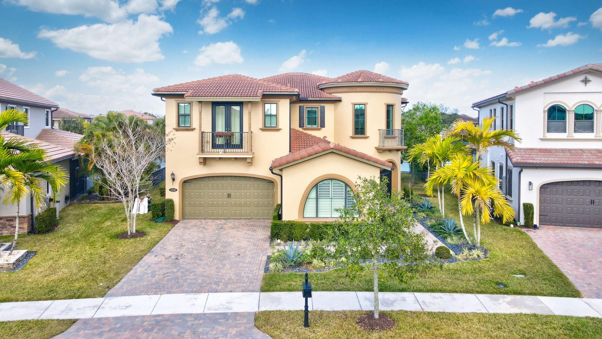 11585 Horizon Road Parkland, FL 33076 - Photo 66 of 91 a front view of a house with a porch