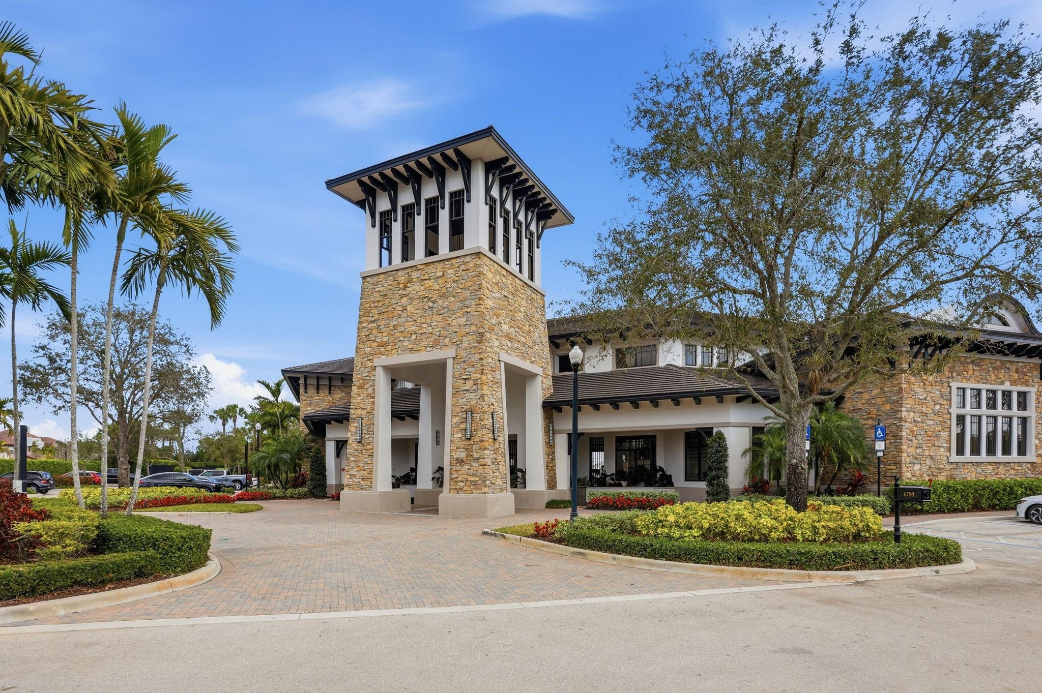 11585 Horizon Road Parkland, FL 33076 - Photo 68 of 91 front view of a building with a garden
