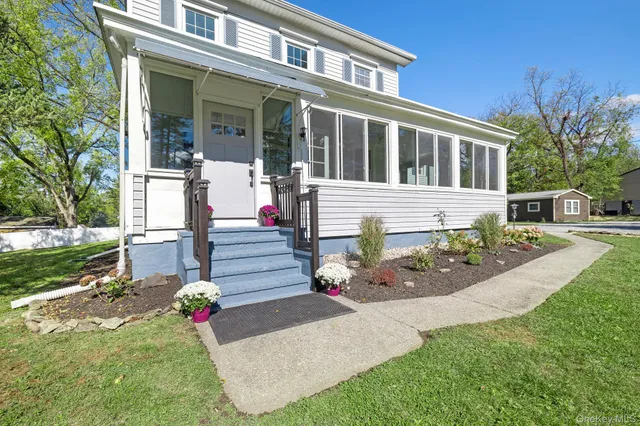 front view of house with a garden