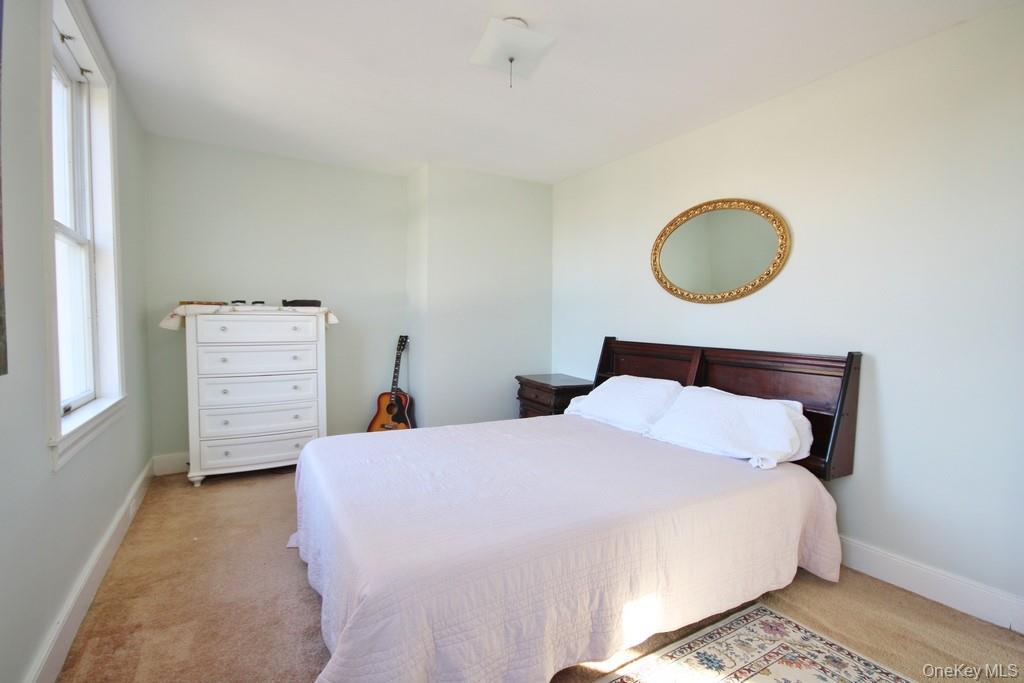 32 Old Glenham Road Beacon, NY 12508 - Photo 23 of 50 a bedroom with a bed and cabinet