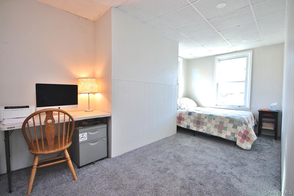 32 Old Glenham Road Beacon, NY 12508 - Photo 26 of 50 a bedroom with a bed and chair