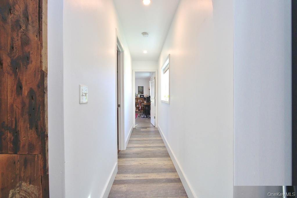 32 Old Glenham Road Beacon, NY 12508 - Photo 44 of 50 a view of a hallway with wooden floor