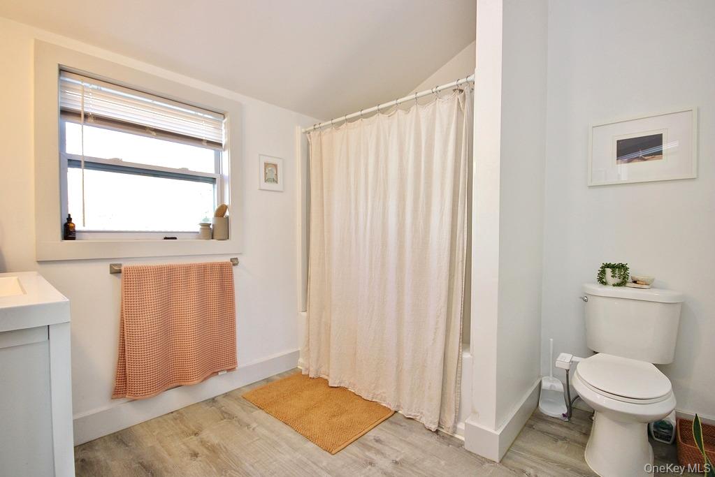 32 Old Glenham Road Beacon, NY 12508 - Photo 45 of 50 a bathroom with a toilet a sink and a window