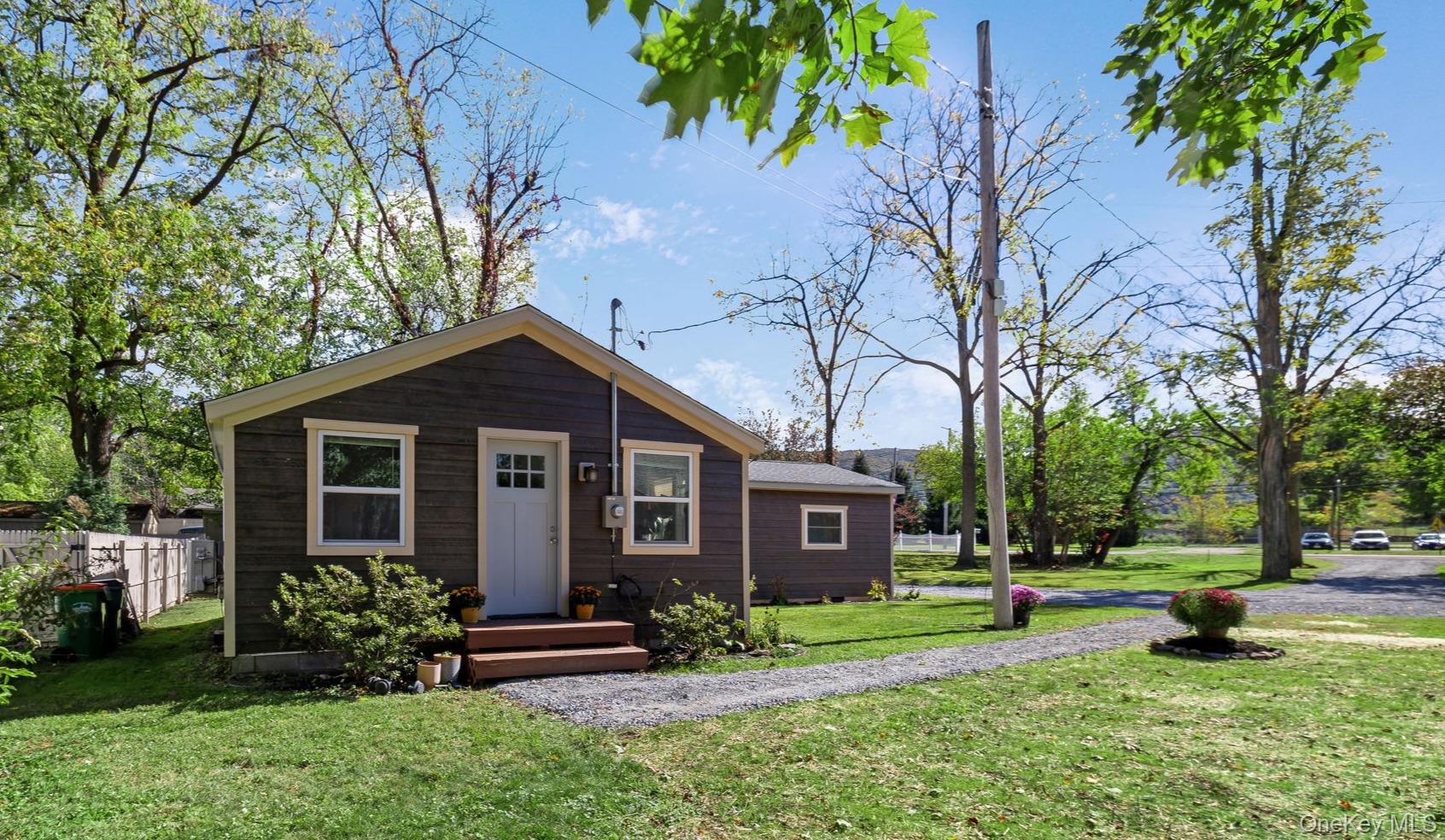 32 Old Glenham Road Beacon, NY 12508 - Photo 46 of 50 a view of a house with a yard and a garden