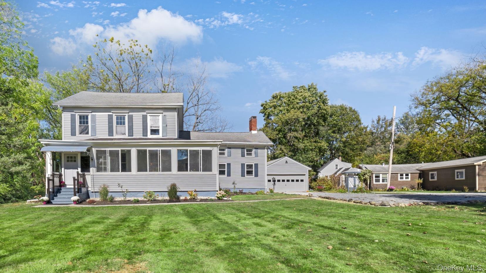 32 Old Glenham Road Beacon, NY 12508 - Photo 47 of 50 a front view of a house with a garden