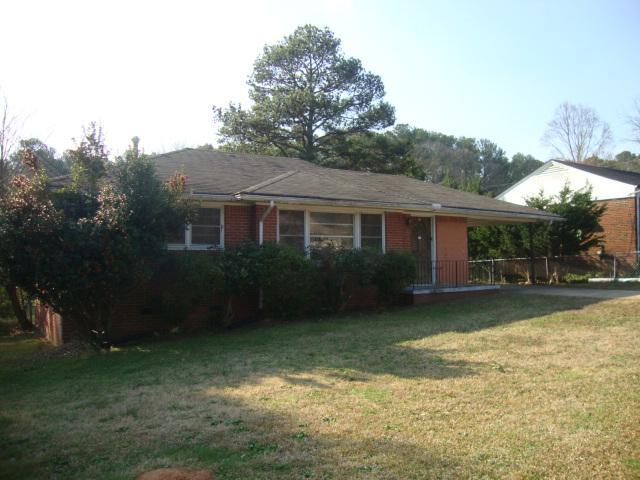 999 Conley Road Forest Park, GA 30297 - Photo 1 of 1 a view of a yard in front of house