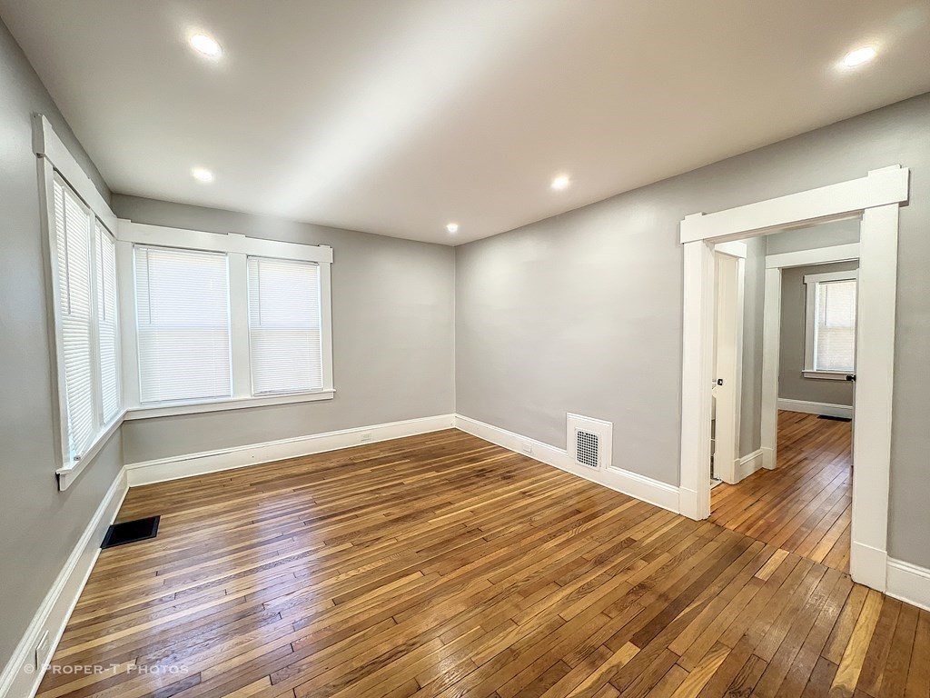 49 Hobson Street Springfield, MA 01109 - Photo 13 of 32 a view of empty room with wooden floor
