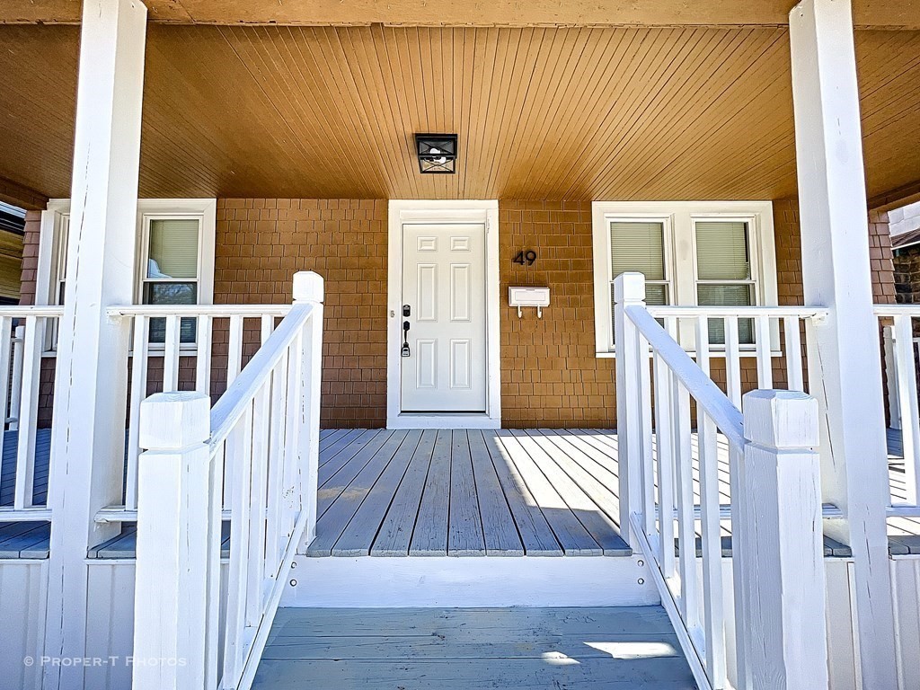 49 Hobson Street Springfield, MA 01109 - Photo 4 of 32 a view of deck with patio