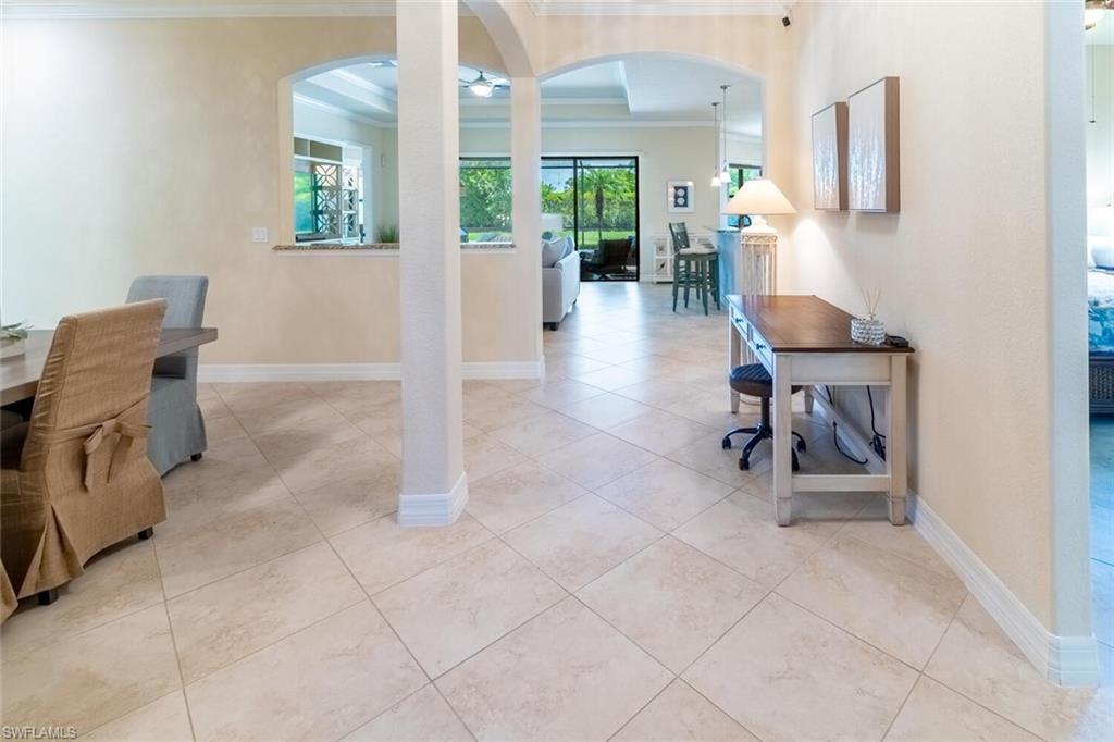 9372 Vercelli Court Naples, FL 34113 - Photo 16 of 50 Tiled office with crown molding