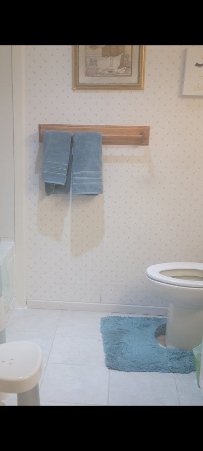 199 Summit View Drive, Unit B Calimesa, CA 92320 - Photo 11 of 34 a bathroom with a toilet