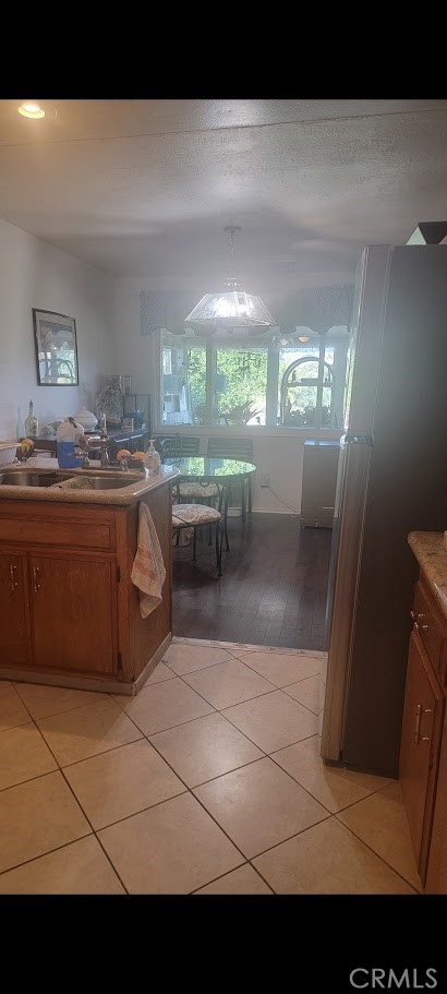 199 Summit View Drive, Unit B Calimesa, CA 92320 - Photo 20 of 34 Kitchen sink area showing Dining sitting area