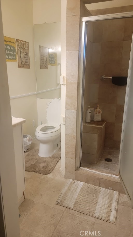 199 Summit View Drive, Unit B Calimesa, CA 92320 - Photo 21 of 34 a bathroom with a toilet and a shower