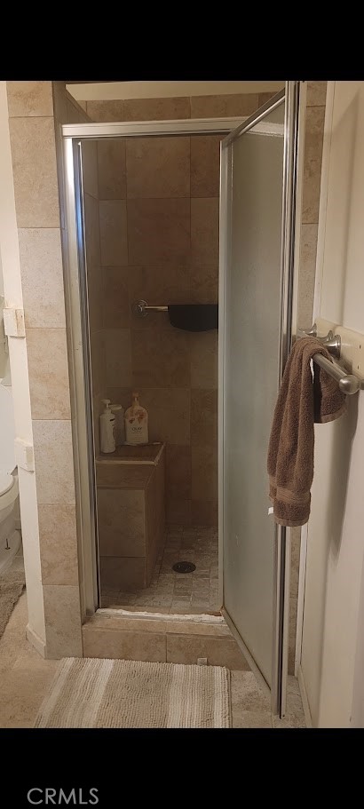 199 Summit View Drive, Unit B Calimesa, CA 92320 - Photo 22 of 34 a bathroom with a shower