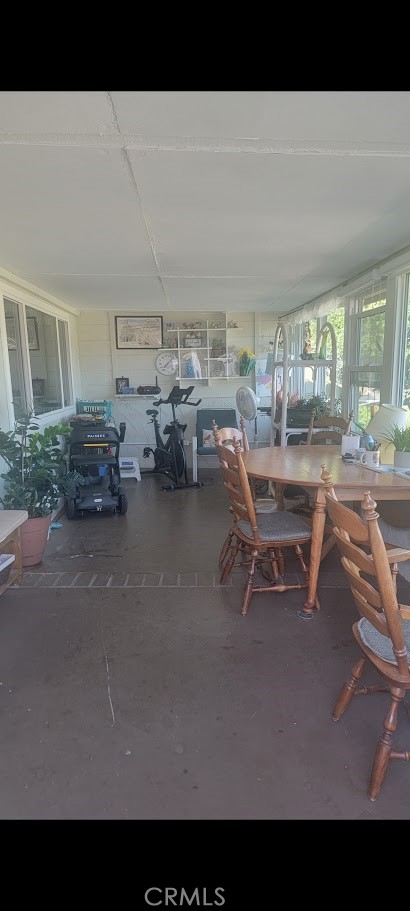 199 Summit View Drive, Unit B Calimesa, CA 92320 - Photo 26 of 34 a living room with lots of furniture and clutter
