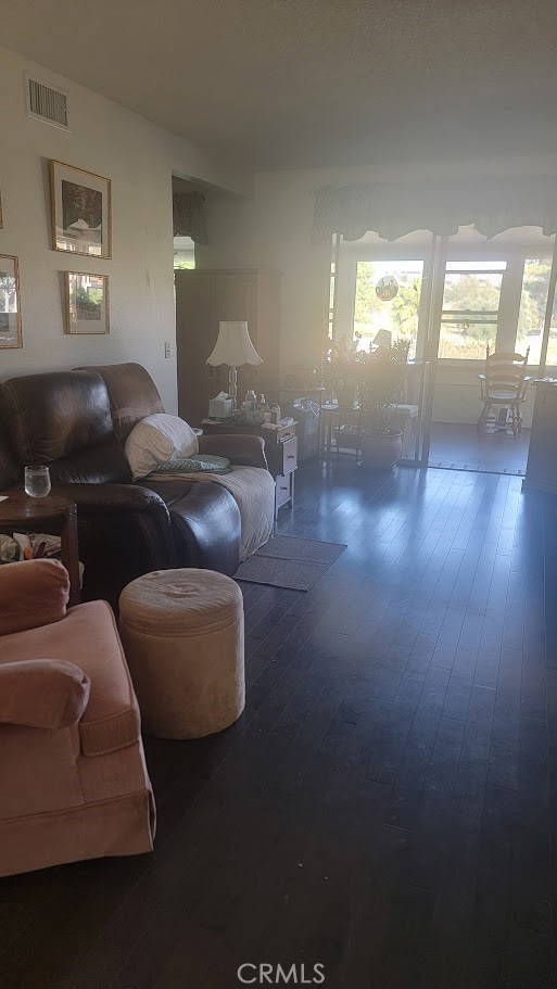 199 Summit View Drive, Unit B Calimesa, CA 92320 - Photo 7 of 34 a living room with furniture and a hard wood floor