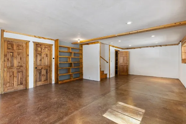 a kitchen with stainless steel appliances granite countertop a stove and a refrigerator