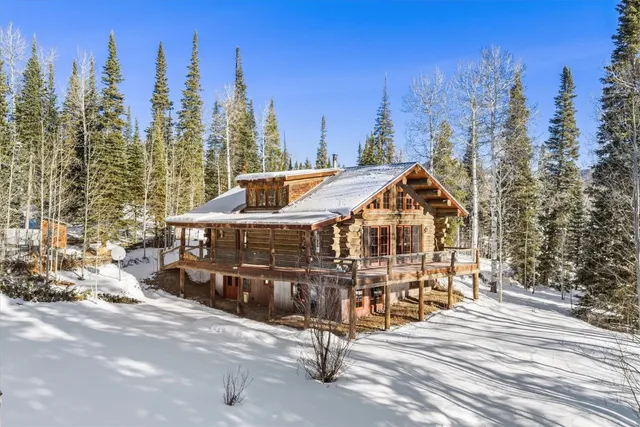 a view of mountain with a mountain in the background