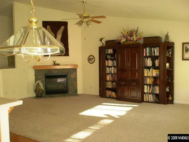 508 Silversmith Place Reno, NV 89511 - Photo 5 of 9 a view of a livingroom with a furniture and a ceiling fan