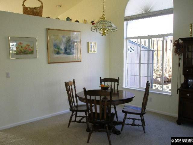 508 Silversmith Place Reno, NV 89511 - Photo 6 of 9 a dining room with furniture and window