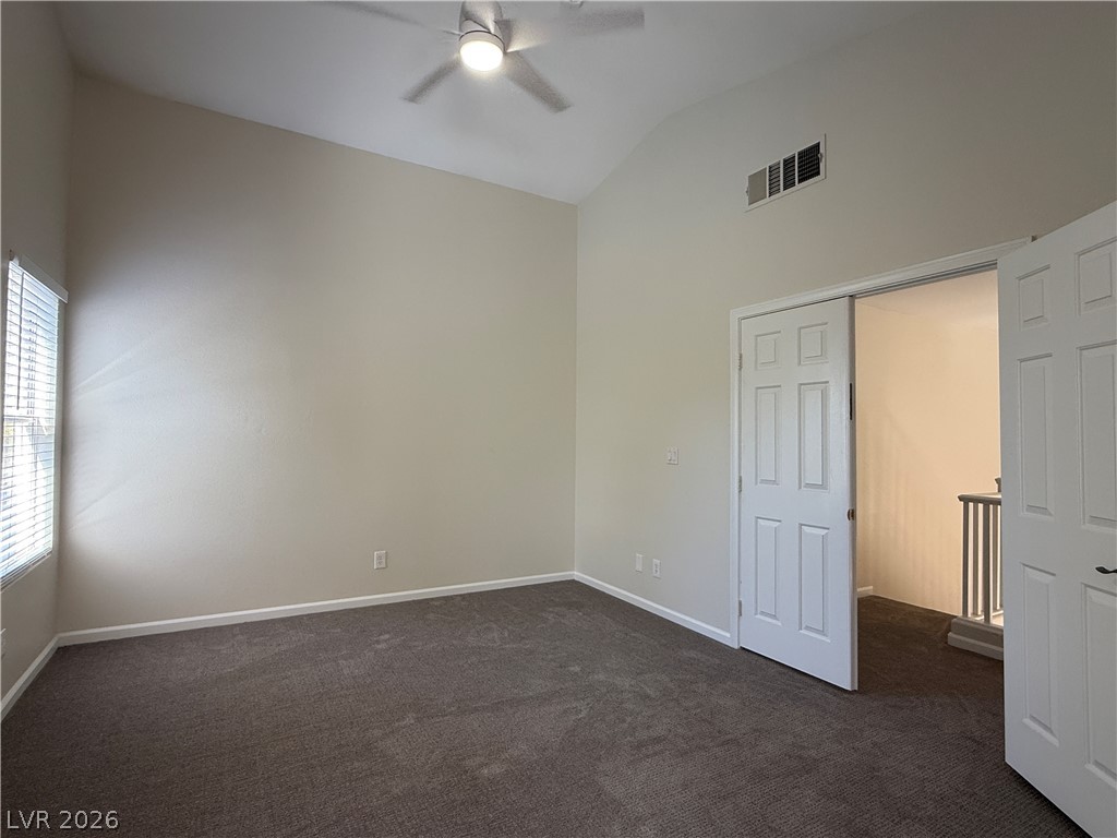 1908 Thunder Ridge Circle Henderson, NV 89012 - Photo 15 of 28 A versatile space with vaulted ceilings and plush carpeting awaits your personal touch.